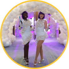 MOMENTUM attendees dressed in all white party attire for the Client Appreciation Party.
